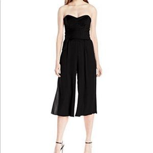 Strapless silk culottes jumpsuit with pockets.